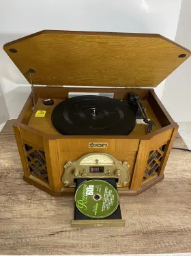 Nr303tt Icon Ion Model Omniplay 4-in-1 Player Cd Tape Phono Am/fm Radio Wood Case