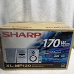 Sharp XL-MP130 High Power Micro Component System Cd, Cassette, & Tuner New. Fixed Price $249.99.