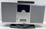 Brookstone Slcd V2.0 Compact Stereo System Player Radio With Remote. Fixed Price $99.99.