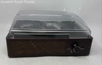 Model M49A Brown Multifunction Headphone Jack Record Player Turntable Not Tested. Fixed Price $19.99.