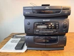 Sharp CD-C444 Working Mini Component System 3-CD Changer Dual Cassette Remote. Fixed Price $55.00.