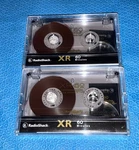 Of 2 Radio Shack Audio Cassette Tapes Xr 60 Minutes. Fixed Price $12.95.